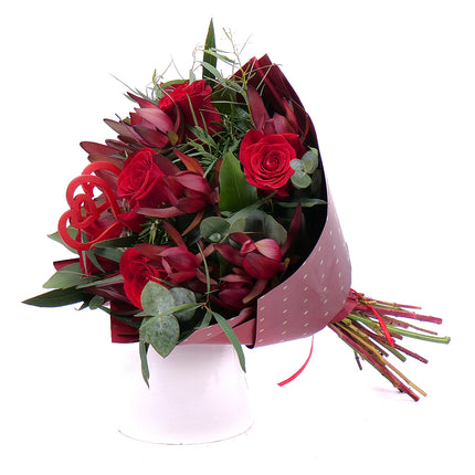 03000658_edes-voros-rozsa-leucadendron