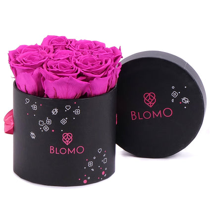 03101536_orok-fekete-blomo-doboz-s-8-rozsas-monalisa-elenk-rozsaszin